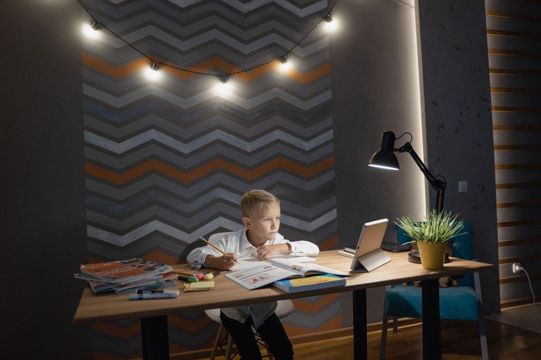 Homework station for kids with a calm desk, storage bins, and soft task lighting