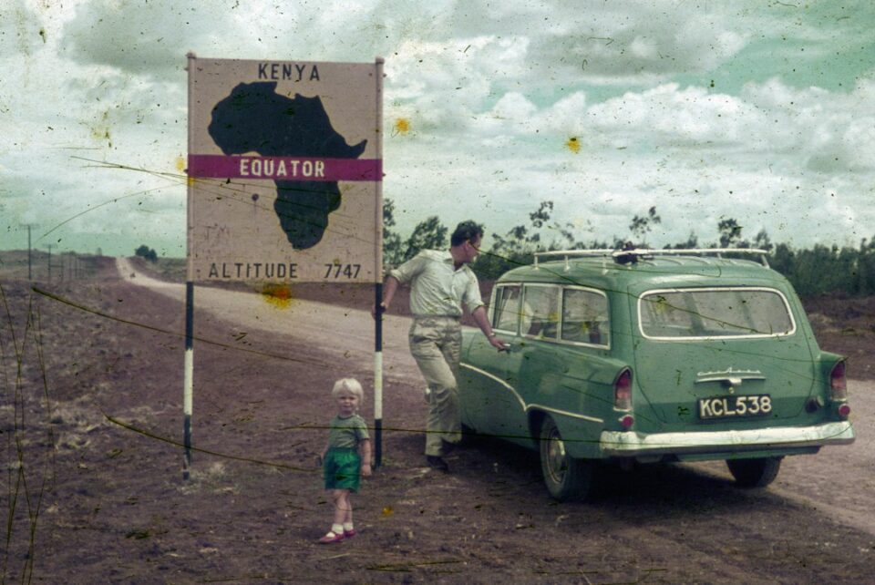 family road trip planner cover image with a happy minivan, route icons, and packing symbols along a scenic highway